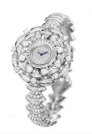 High Jewellery watch with 18 ct white gold bracelet and case (approx. 95.2 gr), entirely paved with 16 round- cut, 394 brilliant-cut and 302 baguette-cut diamonds totalling approx. 22.62 carats. Quartz movement.