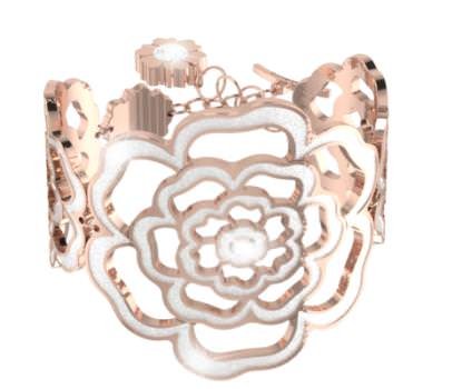 Cuff made of 24K rose gold over bronze with shimmering accents by Rebecca (Centurion Contemporary Metals category winner).
