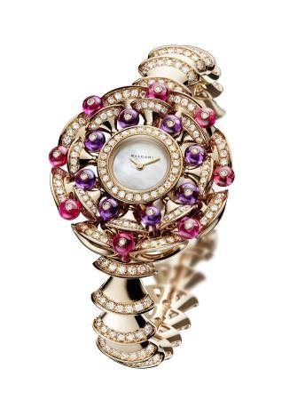 High Jewellery watch with 18 ct pink gold case and bracelet (approx. 97.7 gr) set with 366 diamonds (358 brilliant-cut and 8 round-cut, totalling approx. 7.51 carats), 38 tourmalines (30 square-cut and 8 round-cut) and 16 turquoises. Quartz movement.