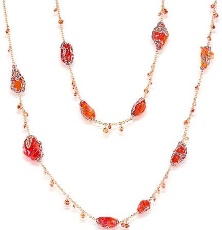 The trendy colour of bright orange was seen in this opal, diamond, and gold necklace by Italian Design.