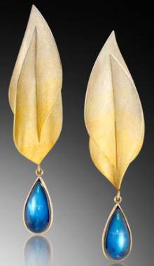 Professional Design Excellence 1st Place winner Adam Neeley of Adam Neeley Fine Art Jewelry in Laguna Beach, California, created hand-fabricated Spectra earrings that transition seamlessly through seven gold colors, from rich yellow to white, and feature the adularescence of rainbow moonstones. (Adularescence, a milky bluish luster or glow, is found most notably when looking at gemstones such as moonstone. It is an optical phenomenon that exists only in the presence of light.)