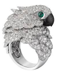 Les Heures Fabuleuses de Cartier: Parrot watch and ring in rhodium-plated white gold set with brilliant-cut diamonds; beak in mother-of-pearl; eyes set with emeralds; quartz movement.