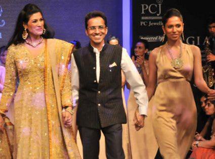 Anup Bohra, centre, with two models wearing Jewels Emporium jewellery.
