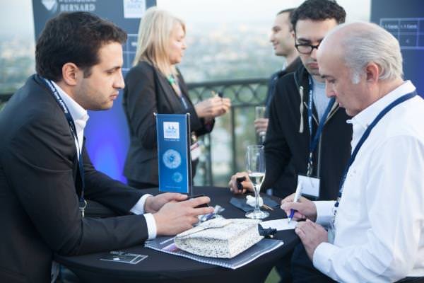 Retailers interact with Belgium diamond representatives in Los Angeles during the “Antwerp Diamond Night,” held May 27, 2014.