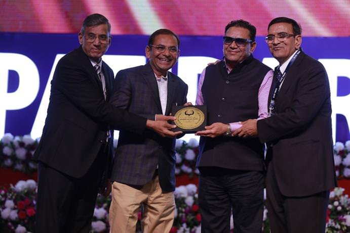 Shree. Vallabhbhai Patel, Chairman, Kiran Gems Pvt Ltd felicitated with ‘Patidar Udhyog Ratn Award' - 2018