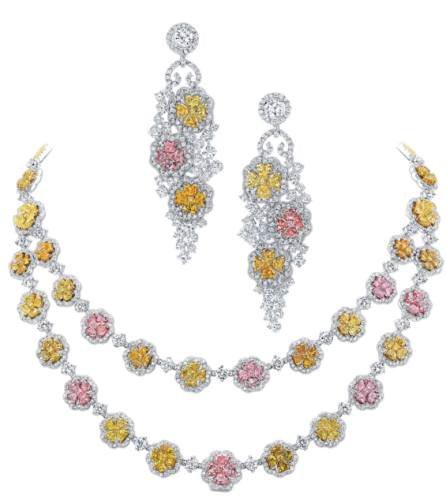 Pink, yellow, and white diamond and gold earrings and necklace.