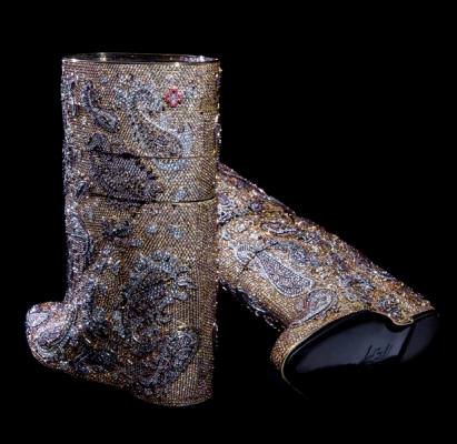 These 'Diamond Boots,' display a paisley pattern completely covered in 1,550 carats of natural fancy colored champagne, grey and pink diamonds from Diarough/UNI-Design. A team of highly skilled craftsmen set all 39,083 diamonds on the boots. 