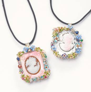 Santagostino featured cameo pendants framed by the brand's signature look of enamel, gold, and gemstones.