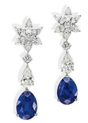 The Burmese sapphire and diamond ear pendants by Cartier, weighing 24.69 and 25.63 carats