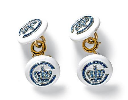 Gold, platinum, white enamel “C” monogram and royal crown. Calibrated buff-top sapphires. Commission from HRH Princess Anastasia of Greece