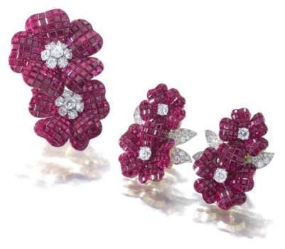 Van Cleef & Arpels: ruby and diamond brooch, “Deux Fleurs” & pair of ruby and diamond ear clips “Pergola Royale”