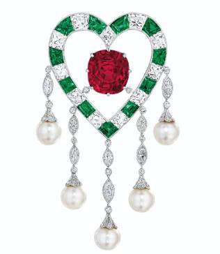 ‘The duPont Ruby,' Burmese ruby, emerald, diamond, and natural pearl brooch of 11.20 carats (,500,000-5,500,000)