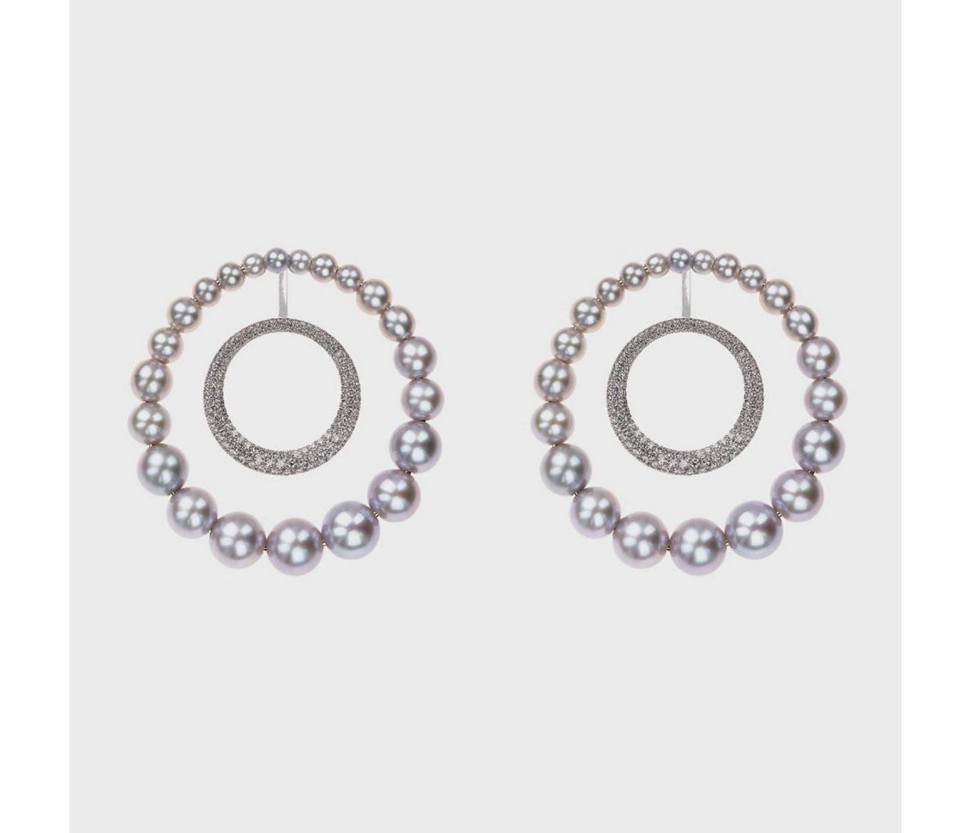 Earrings by Nikos Koulis