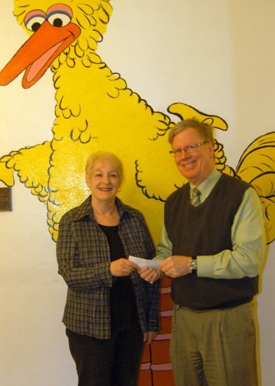 Rusty Clark of Thorpe & Co and Jane Heider , Execuive Director of The Mary Elisabeth Child Care & Preschool Center in Sioux City, Iowa