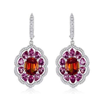  Spinel Earrings: Orange/red spinel centers, totaling 5.00 carats, surrounded by 20 pear-shaped hot pink spinels, totaling 4 .00 carats, and .65 carats diamond accents, set in 18K gold. 
