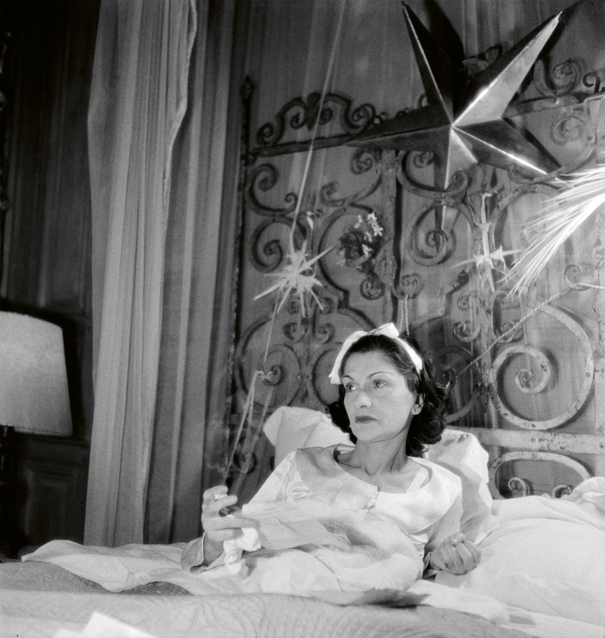 Gabrielle Chanel at 'La Pausa', her villa in Roquebrune-Cap-Martin in the south of France, 1938. Photo Roger Schall ©Collection Schall