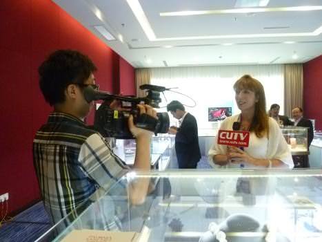 Spanish designer Paloma Sanchez, who featured a range of one-of-a-kind upscale pieces, is interviewed by a local Chinese television station.