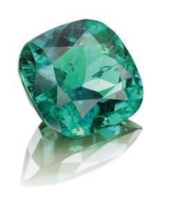 An 8.76-ct emerald cut in Muzo International's Bogotá workshops, from a 47.88-ct rough, mined in Muzo, Colombia, certified to be resin-free (photo: Muzo International).