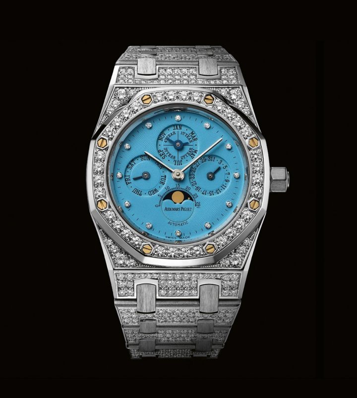 Royal Oak Perpetual Calendar 25932BC. Perpetual calendar: day, date, week, month, leap year, phase and age of the Moon. Self-winding Calibre 2141/2806, Movement 442916. Bracelet 789. 33mm case D80708 in white gold set with 540 diamonds. Sold in Germany in May 1999.