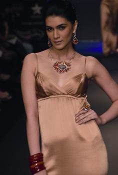 Model wearing diamond and gemstone jewellery at II JW by Jewels Emporium.