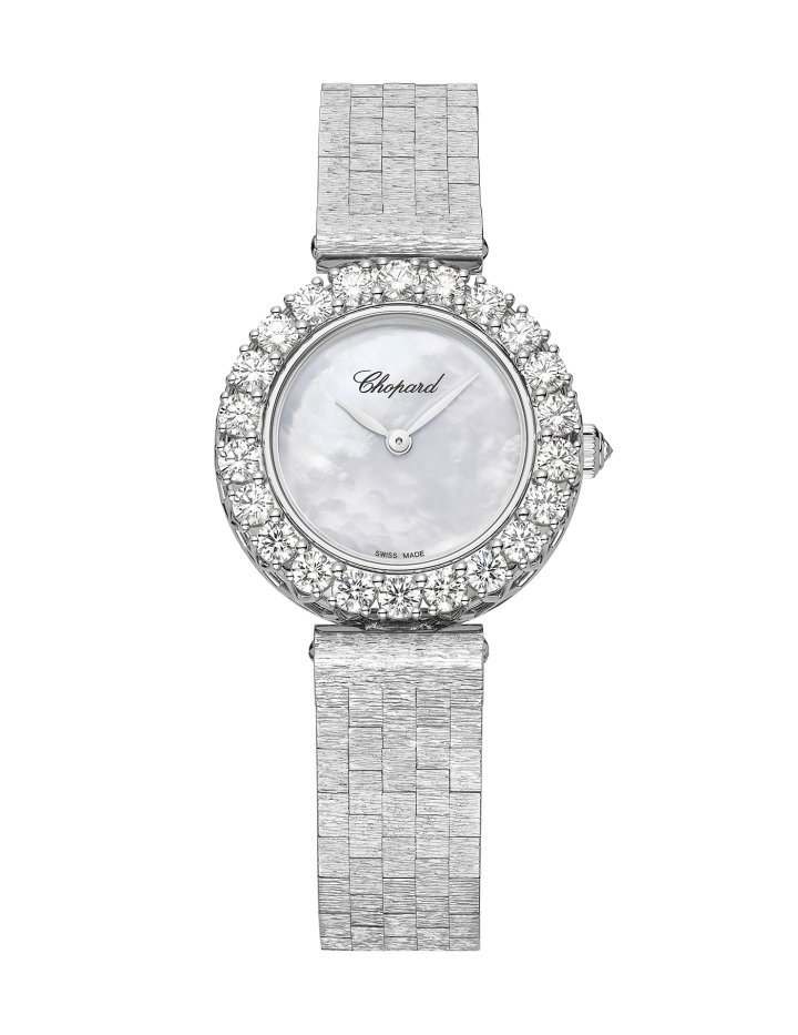 L'Heure du Diamant, 26mm case in ethical 18k white gold, bezel in ethical 18k white gold set with brilliant-cut diamonds (totalling 2.20 carats), Chopard 10.01-C mechanical automatic movement, mother-of-pearl dial, bracelet in ethical 18k white gold engraved with the iconic bark motif. 