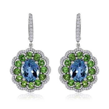  American Gem Trade Association Spectrum Design Award winner, Honorable Mention in the Bridal Categ ory, platinum earrings featuring aquamarines (5.61 tcw) and grossular garnets ( 3.51 tcw), accented with diamonds (.56 tcw). 
