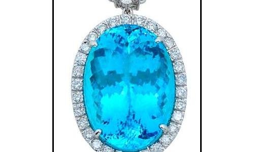 Vianna Brasil showcased a very rare certified 24.69-carat oval Paraiba tourmaline