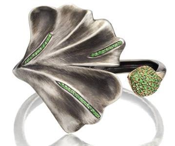 Silver, 14K yellow gold, and tsavorite “Gingko” hinged cuff by Babette Shennan (Centurion Emerging Designer).