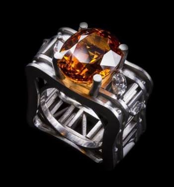 Enrico Cirio - Ring – Mandarin garnet 17 ct. and 4 navette diamonds 1.11 ct., white gold.