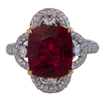 Lotus: Ring in 18K white gold (6.89g), set with a 5.42-ct natural vivid orangy-red Burmese spinel and four round white diamonds (0.20ct), surrounded by diamonds (0.86ct).