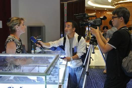 American designer Jacqui Grande, who featured high-end gemstone and gold jewelry, is interviewed by Taiwan's EBC TV network.