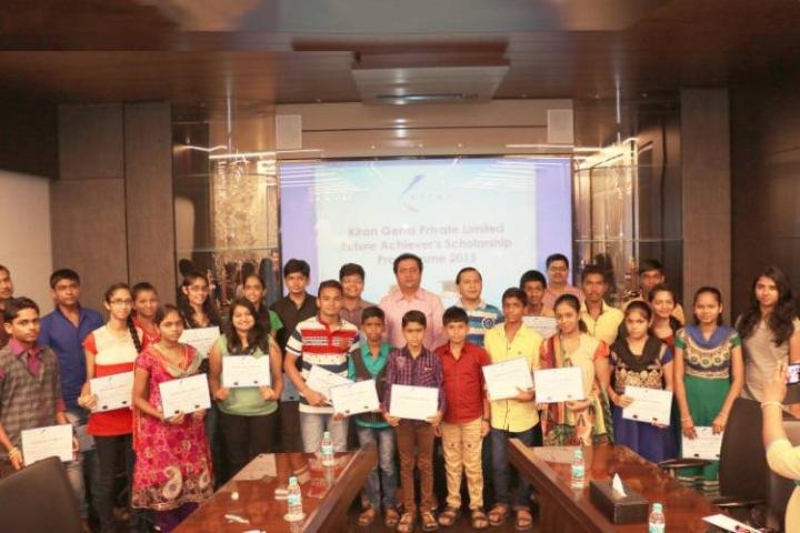 Kiran Gem's Director, Mr Dinesh Lakhani, with Scholarship Winners