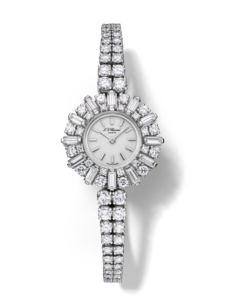 1964 - Ladies' wristwatch, white gold, silvered dial, articulated bracelet, 102 diamonds (8.32 carats), 12 baguette-cut diamonds (2.26 carats), mechanical movement. Featured in an advertisement from 1964 with the text “Maîtres de la montre-bijou, (“Masters of the jewellery watch”).