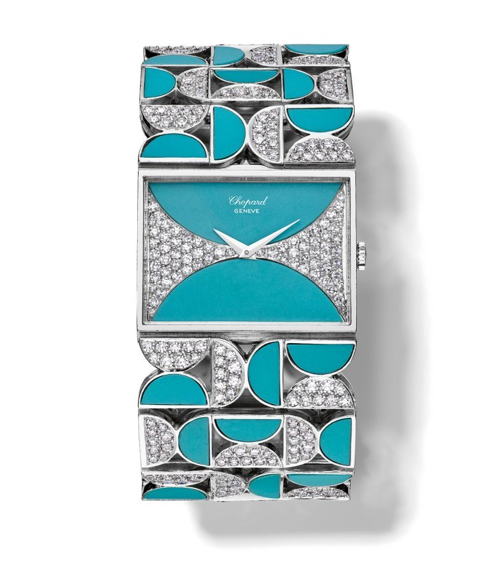 1973 - Ladies' wristwatch, white gold, dial set with 66 diamonds and turquoises, articulated bracelet set with 432 diamonds and turquoises.