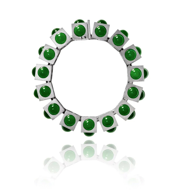 Cube Collection: perfectly domed jadeite set flush in flexible cubes of grey gold. An intricately bold mechanism holds the cubes to allow flexibility.