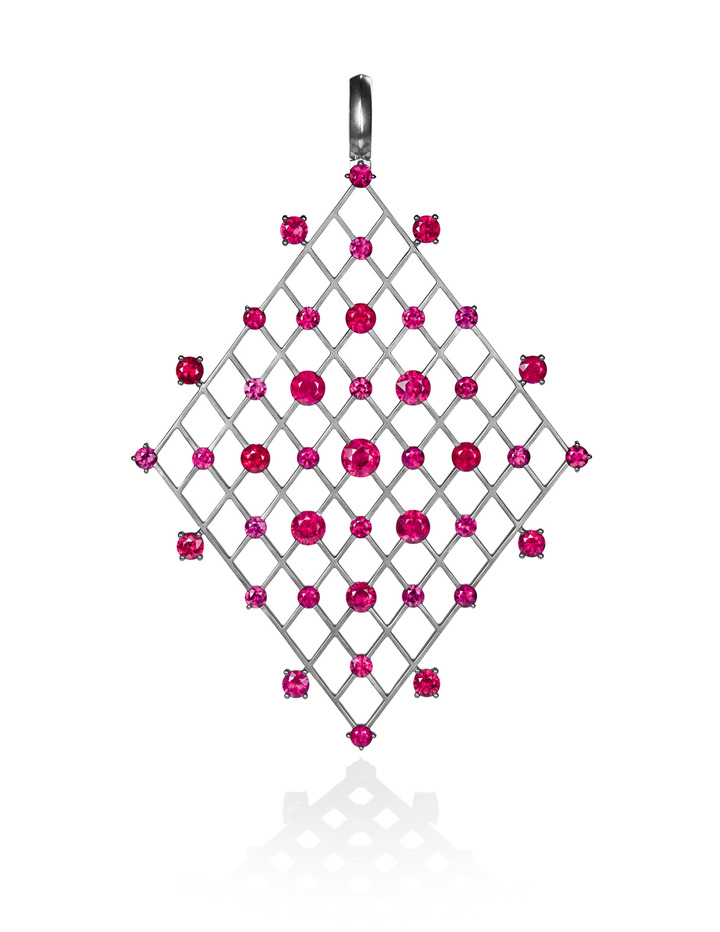 Grid Pendant, grey gold draws the grid, rubies define the points